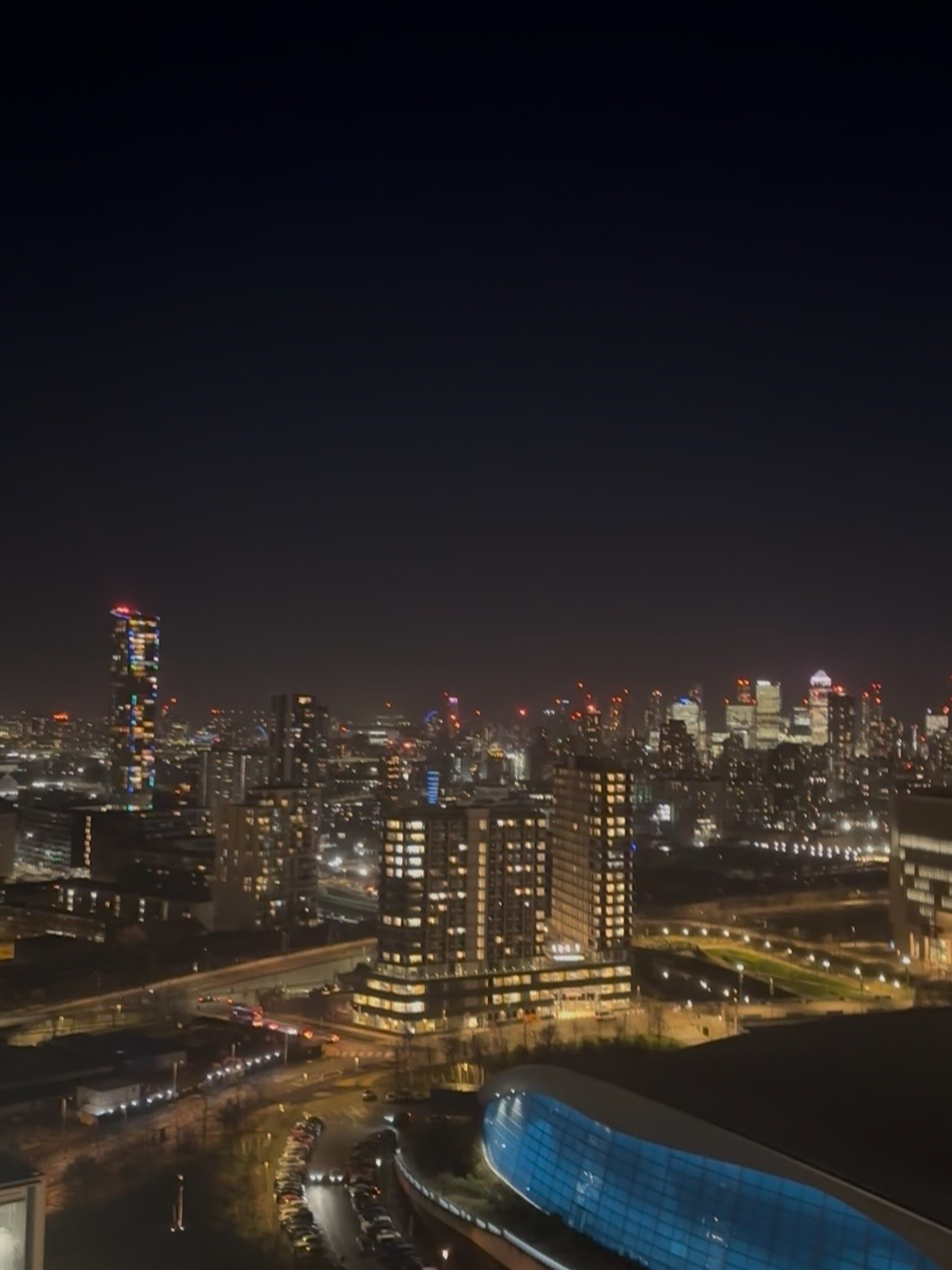 Night-time view of the London skyline, including Canary Wharf, taken from the 15th floor terrace of the FCA's offices in Stratford.
